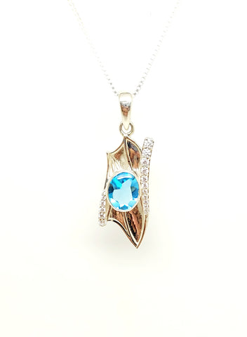 Abstract Blue Topaz and Diamond Pendant in White Gold
