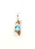 Abstract Blue Topaz and Diamond Pendant in White Gold