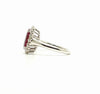 Oval Ruby and Round Diamond Halo Ring in 14k White gold