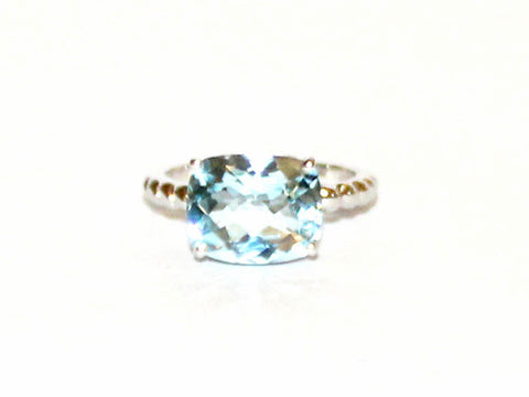 East And West Blue Topaz Ring